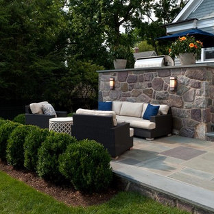 This is an example of a victorian patio in New York with no cover.