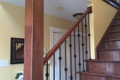 Example of an arts and crafts staircase design in Other