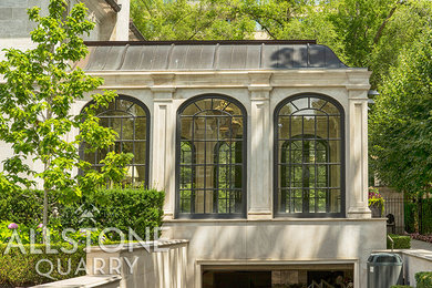 Example of a mid-sized classic white two-story stone exterior home design in Toronto