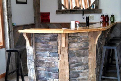 Mountain style home bar photo in Burlington
