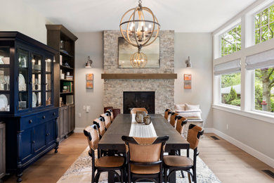 Example of a transitional dining room design in Seattle