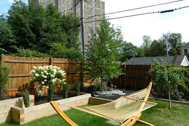 Inspiration for a mid-sized contemporary green wood gable roof remodel in New York