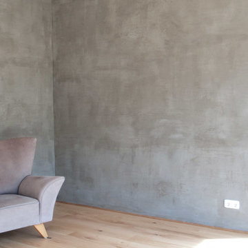 Mineralputz in Beton und einer Akzentfarbe