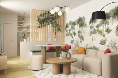 Diseño de sala de estar abierta actual pequeña con suelo de madera clara y televisor independiente