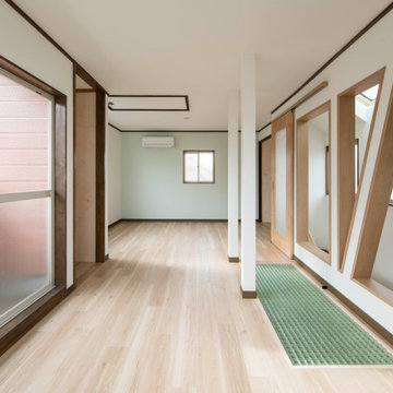 個室：廊下の壁・２室間の壁をとって１室空間に「光と風のリノベーション住宅」：東京都北区