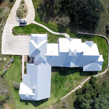 Custom Home with White Metal Roof