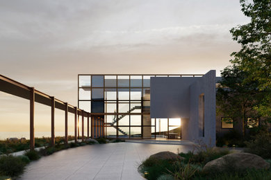 Trendy glass exterior home photo in Los Angeles