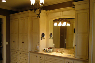 Bathroom - master bathroom idea in Louisville with a drop-in sink, beaded inset cabinets and white cabinets