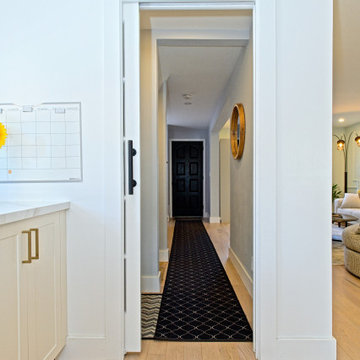 Kitchen View into the Hallway Through a Sliding Glass Door | The Junction