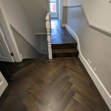 Rich, dark, Jacobean oak in an herringbone parquet layout | Balham SW17