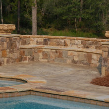 Double decker stone wall/bench with pool/spa