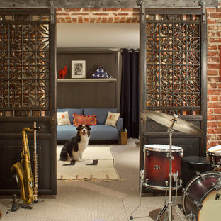 This is an example of a bohemian basement in Denver with red walls, carpet and beige floors.