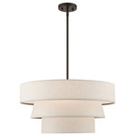 Livex Lighting - Chandler 4-Light English Bronze Pendant Chandelier - The Chandler pendant chandelier is both modern and versatile. The hand-crafted oatmeal colored fabric hardback shade is set off by the silky white fabric on the inside setting a pleasant mood. The four-light triple drum shade adds character to this handsomely styled pendant.  Perfect fit for the living room, dining room, kitchen and bedroom. This sleek design is shown in an english bronze finish.