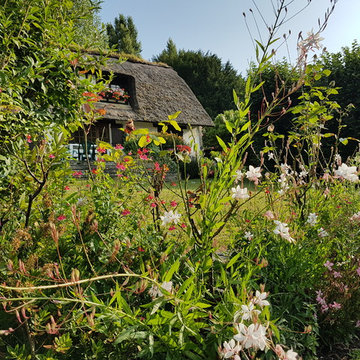 vue sur les terrasses fleuries et mixed-border