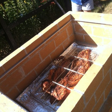 The Castillo Family Wood Fired Pizza Oven & La Caja Style Pig Roaster in WA
