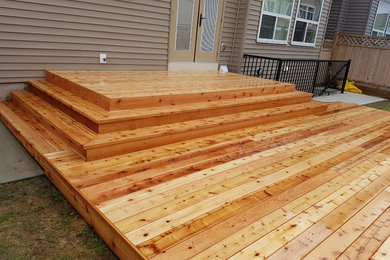 cedar deck with wrap around stairs