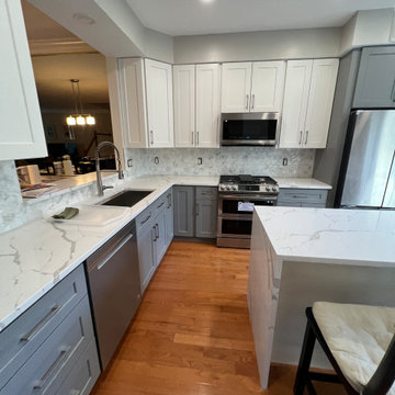Two-Tone Kitchen Remodel with Waterfall Island in Falls Church, VA