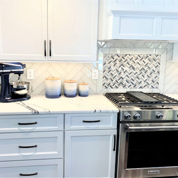 White and Blue Cabinet Kitchen with Cambria Portrush Quartz