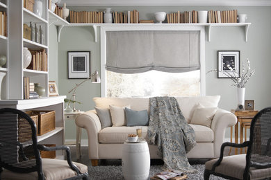 Example of a large transitional enclosed dark wood floor and brown floor family room design in San Francisco with gray walls, no fireplace and no tv