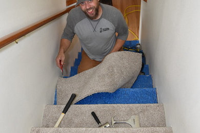 Example of a mid-sized classic carpeted straight staircase design in Seattle with carpeted risers