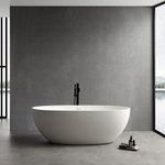 Wellfor - Stone Resin Solid Surface Freestanding Bathtub, White, 65" - Elevate your bathing moments with the White Oval Shape Solid Surface Freestanding Bathtub. Designed ergonomically to provide you with the utmost comfort and relaxation during bathing. Its modern style with clean lines effortlessly complements various bathroom decors. Crafted with resin stone solid surface, it boasts exceptional durability and warm-keeping, making your bathroom more dazzling than ever.