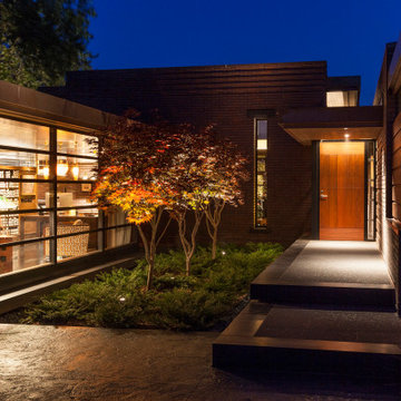 Lac La Belle - Modern Brick Lake Home with Dock and Boathouse
