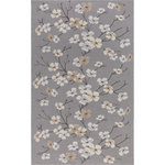 Company C - Sakura Indoor/Outdoor Rug 9x13 - Celebrated in Japan for their ephemeral beauty, "sakura," or cherry blossoms, offer a nature-inspired pattern with a lovely vintage appearance. The placed pattern is beautifully designed to be fully displayed on any size of this indoor/outdoor rug option. Hand-hooked of 100% polypropylene yarns that mimic the look and feel of wool, Sakura's high-quality synthetic fibers can be easily cleaned and hold up to weather and foot traffic.