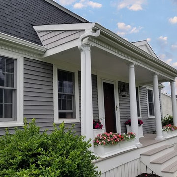 Vinyl Siding and Farmer's Porch add Curb Appeal to Fairhaven, MA Home!