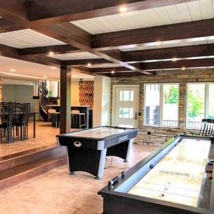 Large contemporary walk-out basement in Chicago with white walls, ceramic flooring, a two-sided fireplace, a stone fireplace surround and beige floors.