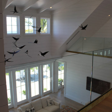 Glass Balustrade with Aluminum Base Rail Finished with Satin Brass Cladding