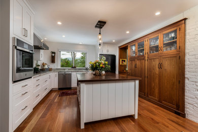 Example of a transitional kitchen design in Burlington