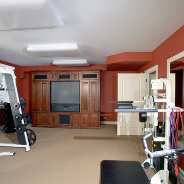 Basement home gym with custom tv cabinet