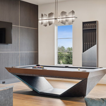 Stealth Pool Table, Custom Stealth Oval Poker Table, and Arella Cue Rack