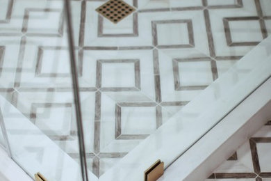 Corner shower - mid-sized modern 3/4 white tile and stone tile marble floor and white floor corner shower idea in Los Angeles with flat-panel cabinets, light wood cabinets, a one-piece toilet, white walls, a vessel sink, wood countertops, a hinged shower door and beige countertops