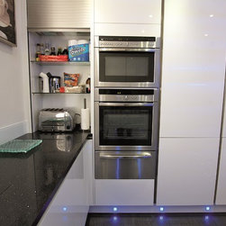 White gloss kitchen with tambour unit - Kitchen Cupboard Organisers
