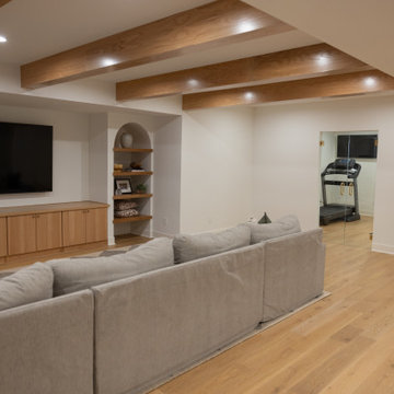 Modern Cozy Basement Remodel with Kings Buff Oak Flooring
