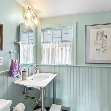 Capitol Hill Transformation - Charming custom bathroom remodel with wainscoting
