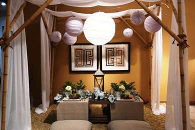 Example of a carpeted dining room design in Cleveland with yellow walls
