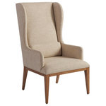 Barclay Butera - Seacliff Upholstered Host Wing Chair - The Seacliff host chair makes a grand statement in the dining room by virtue of its styling and scale. The classic wing design has been streamlined, giving it a fresh look, and a kidney pillow is included, offing the opportunity for a contrasting fabric application. The silhouette is available as shown in the Sandstone finish or also in the Sailcloth finish as 921-883-01.
