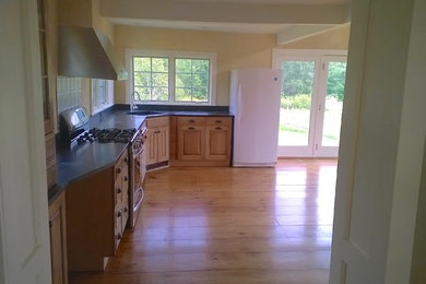 This is an example of a farmhouse kitchen in Burlington.