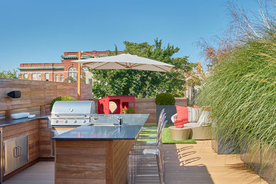 Inspiration for a contemporary rooftop rooftop outdoor kitchen deck remodel in Chicago with no cover