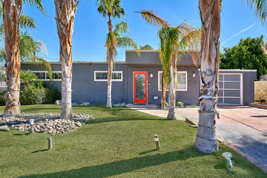 1960s gray one-story brick exterior home idea in Other