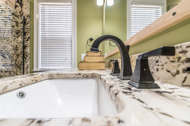 Doorless shower - large traditional master doorless shower idea in Nashville with green walls, a drop-in sink and granite countertops