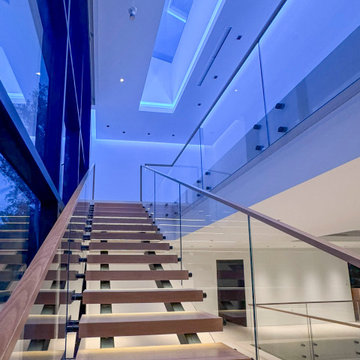 Project #126 | Contemporary Staircases with Integrated LEDs & Glass Railing