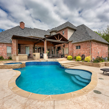 Custom Freestanding Outdoor Living Arbor with Kitchen, Fireplace & Entertainment
