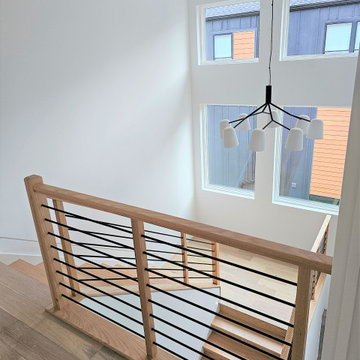 Project #108 | Red Oak Staircase in Light-Filled Space