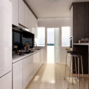 Contemporary kitchen pantry ideas - Trendy kitchen pantry photo in Singapore with a double-bowl sink, dark wood cabinets and quartz countertops