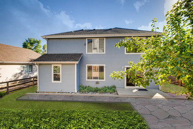 Elegant blue house exterior photo in Denver