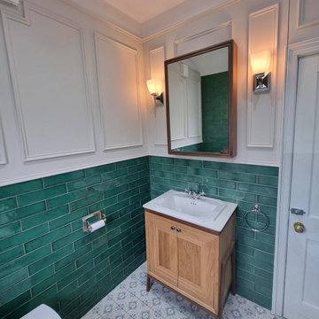 Traditional Bathroom with Wall Panels and freestanding tub