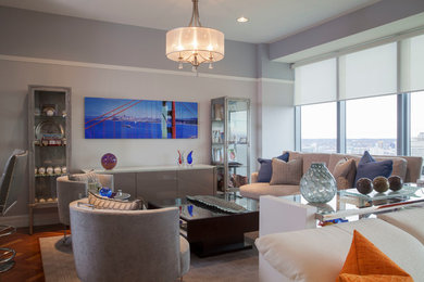 Living room - mid-sized modern open concept medium tone wood floor living room idea in Boston with blue walls, a standard fireplace, a stone fireplace and a wall-mounted tv